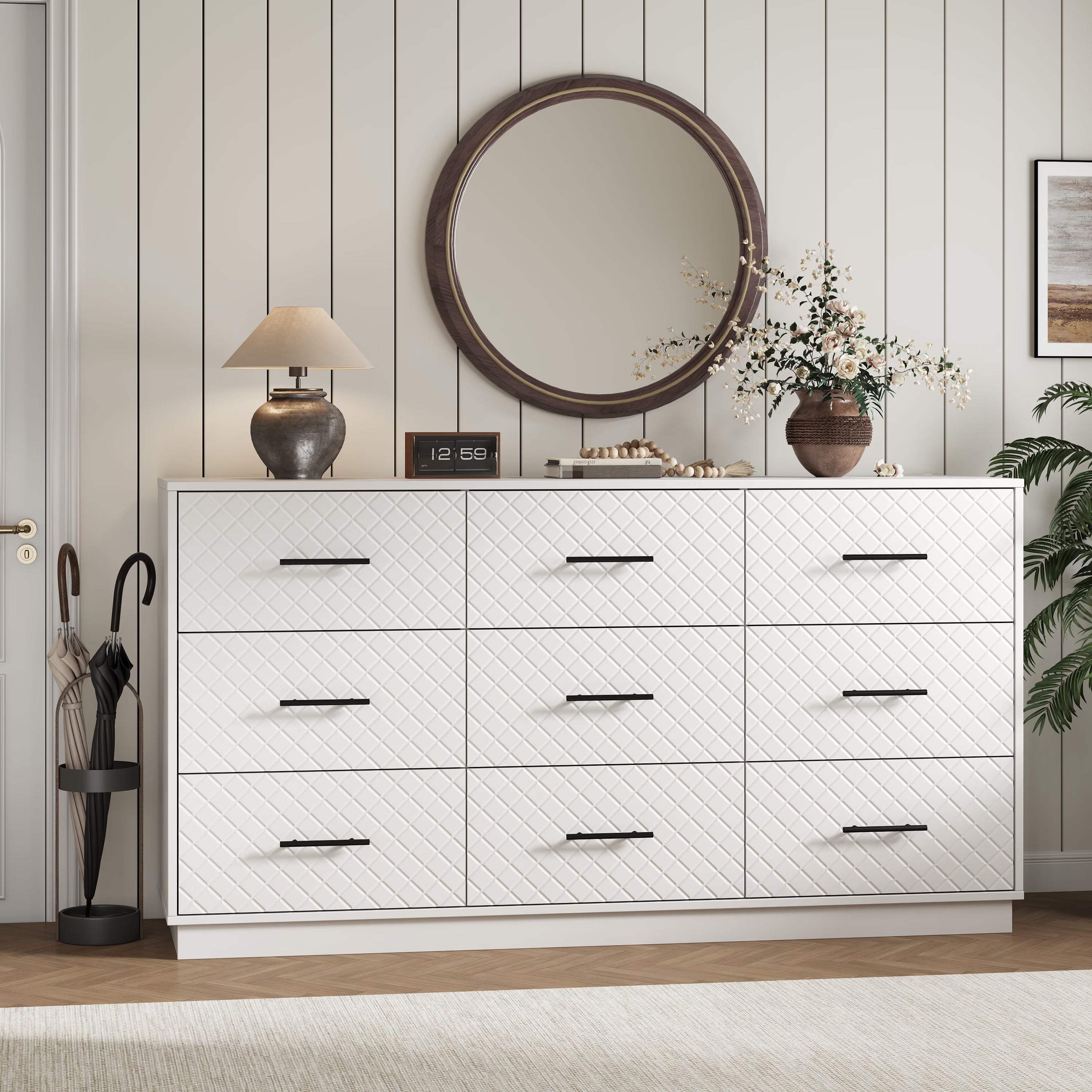 White 9-drawer double dresser styled in an entryway with a round mirror