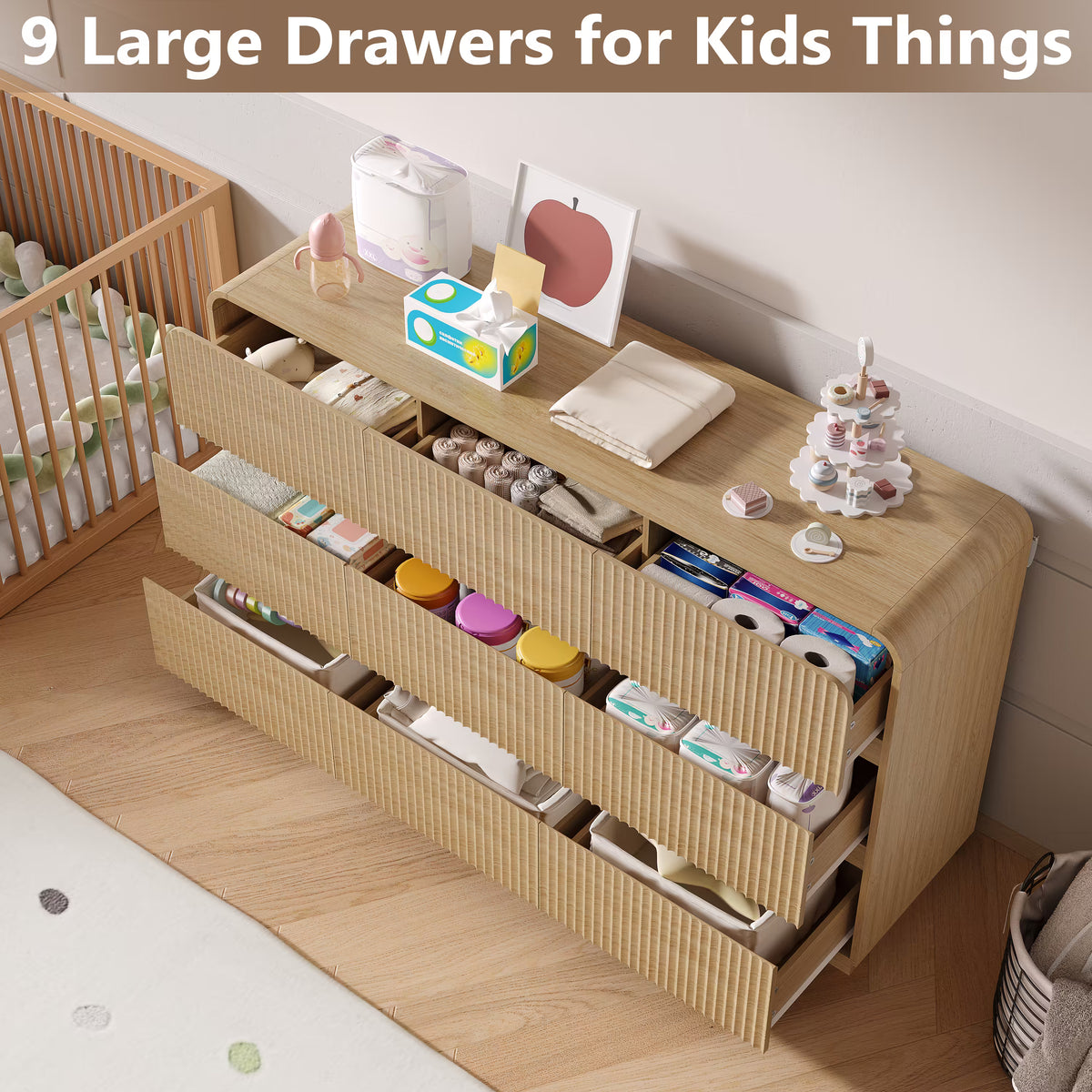 Oak kids dresser featuring 9 large drawers perfectly organizing diapers clothes and nursery essentials