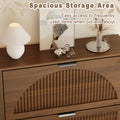 Elora walnut finish shoe storage cabinet with decor on the top surface