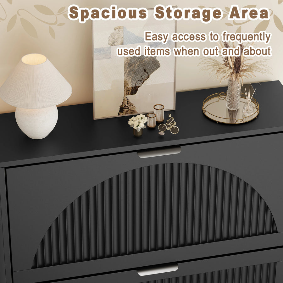 Elora black shoe storage cabinet with decor on the top surface