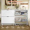Elora white flip-drawer cabinet storing sneakers, flats and ankle boots
