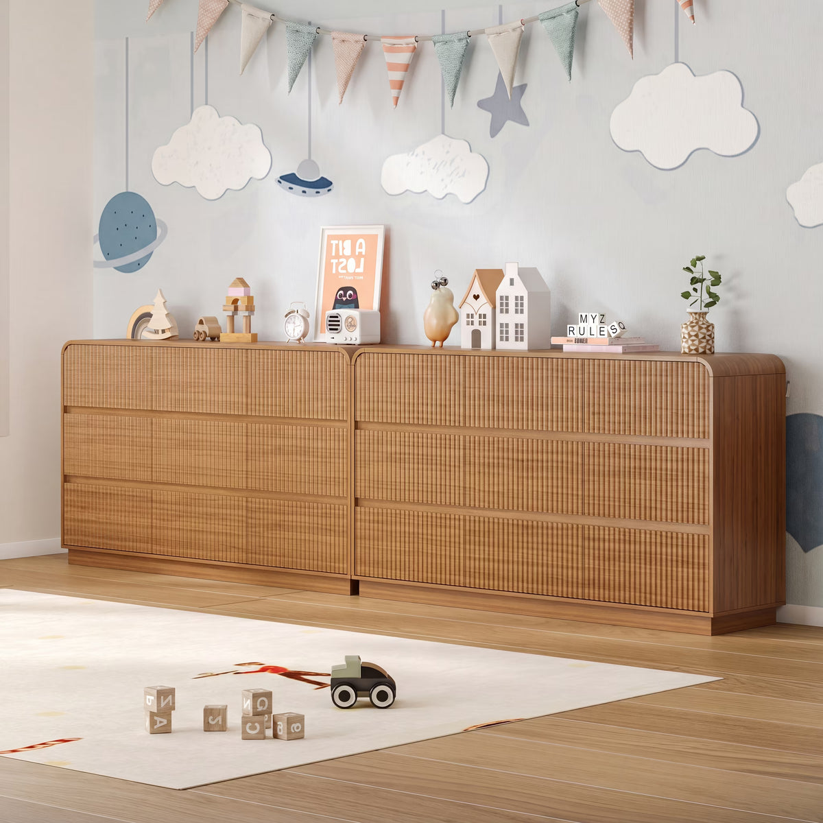 Premium 9 drawer fluted walnut wood dresser decorated with charming nursery accessories