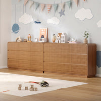 Premium 9 drawer fluted walnut wood dresser decorated with charming nursery accessories