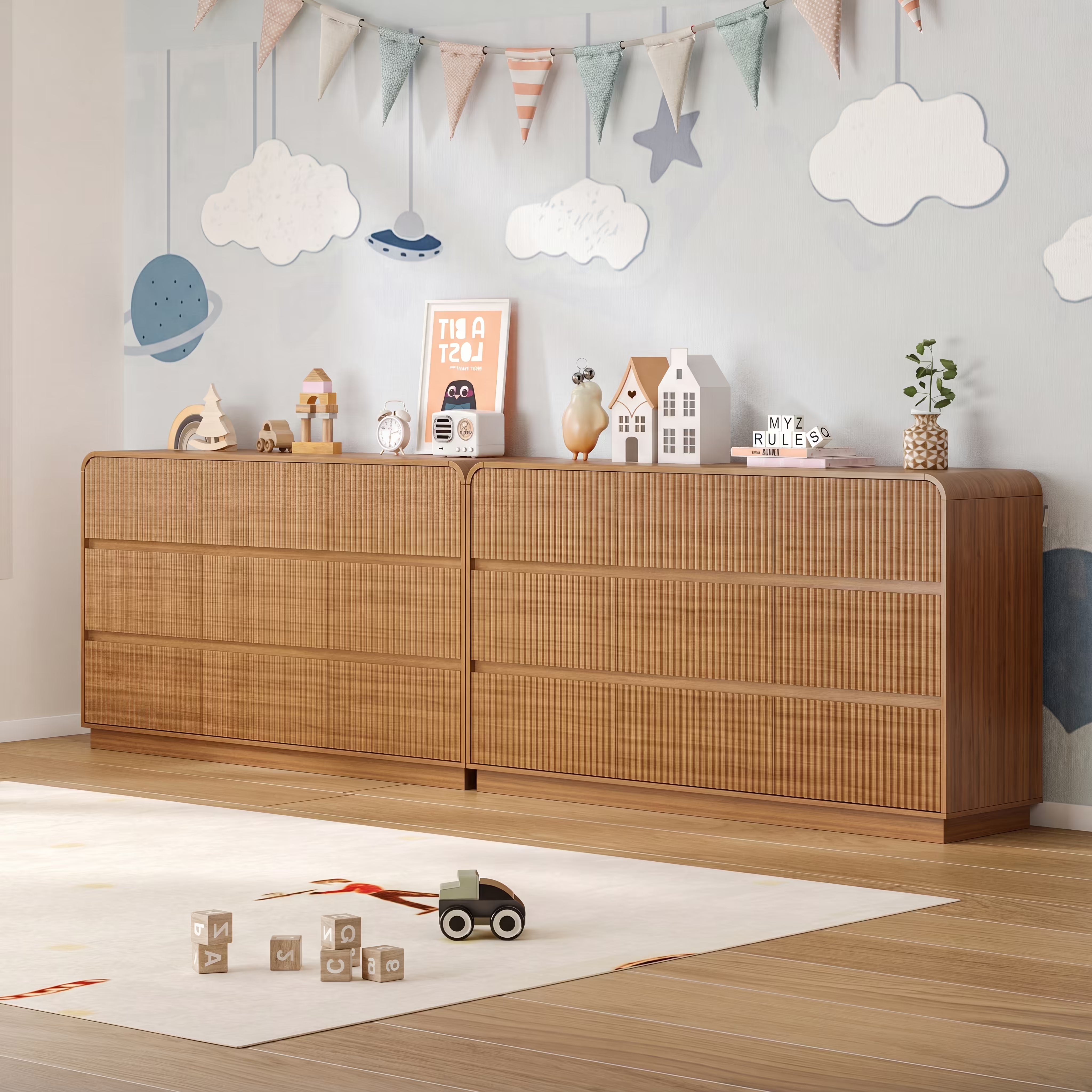 Premium 9 drawer fluted walnut wood dresser decorated with charming nursery accessories