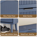 Elora blue shoe cabinet details: fluted doors, metal handles and raised legs