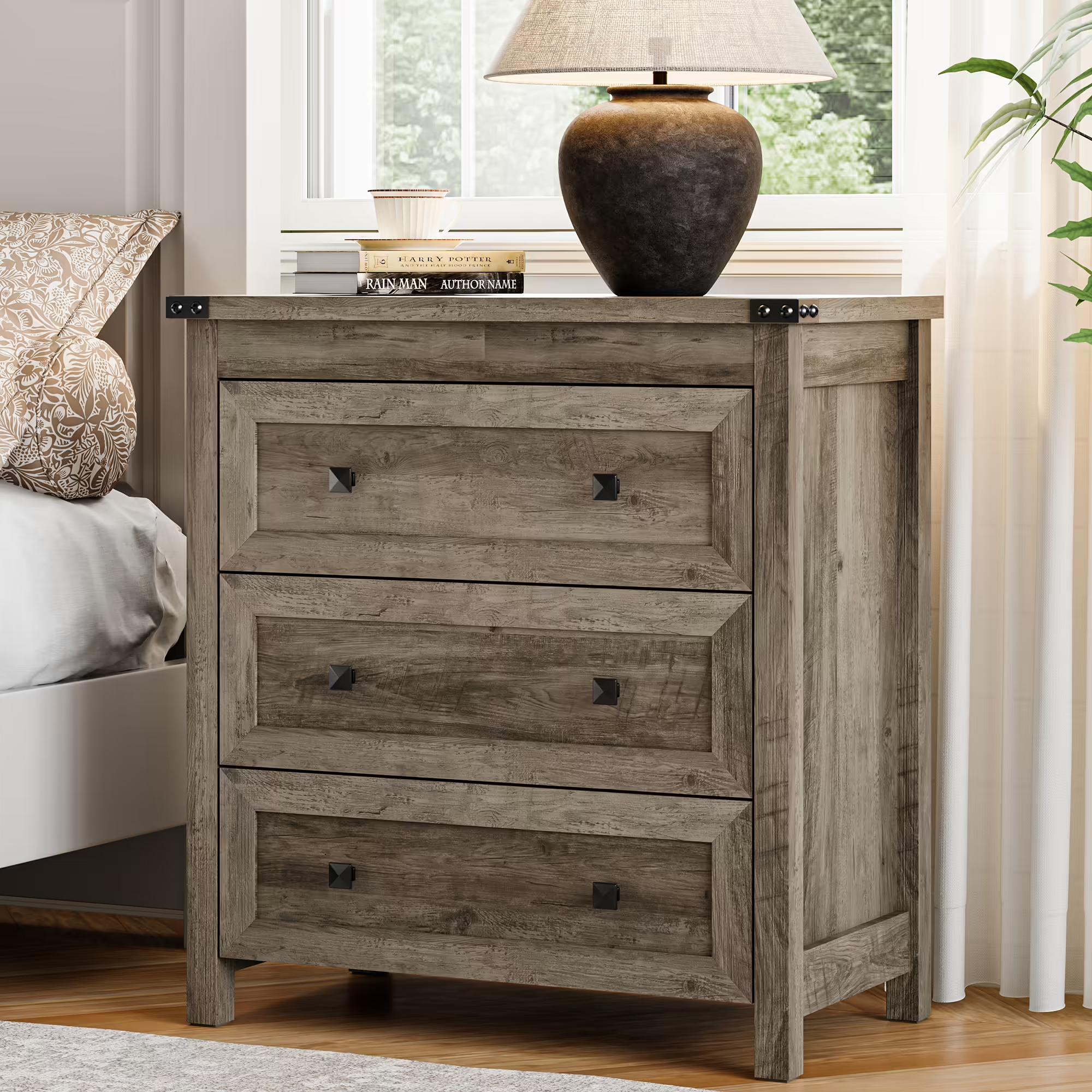 Wood gray farmhouse nightstand with 3 drawers styled beside bed with lamp