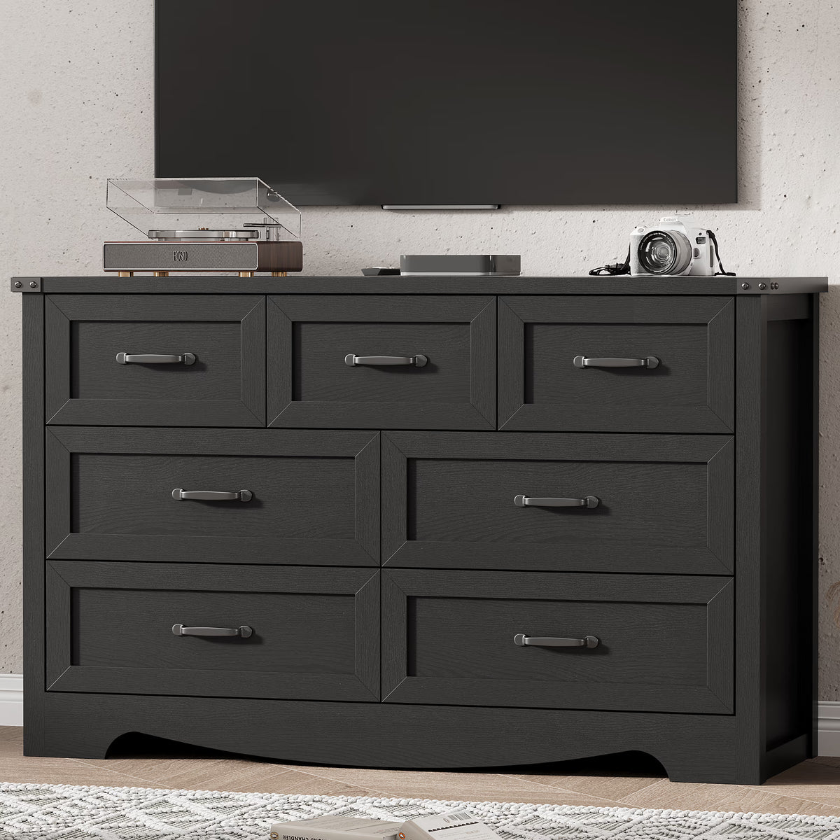 Anymaple Marlow Collection Black 7-drawer wide dresser with deep storage drawers and black metal handles, TV stand room view