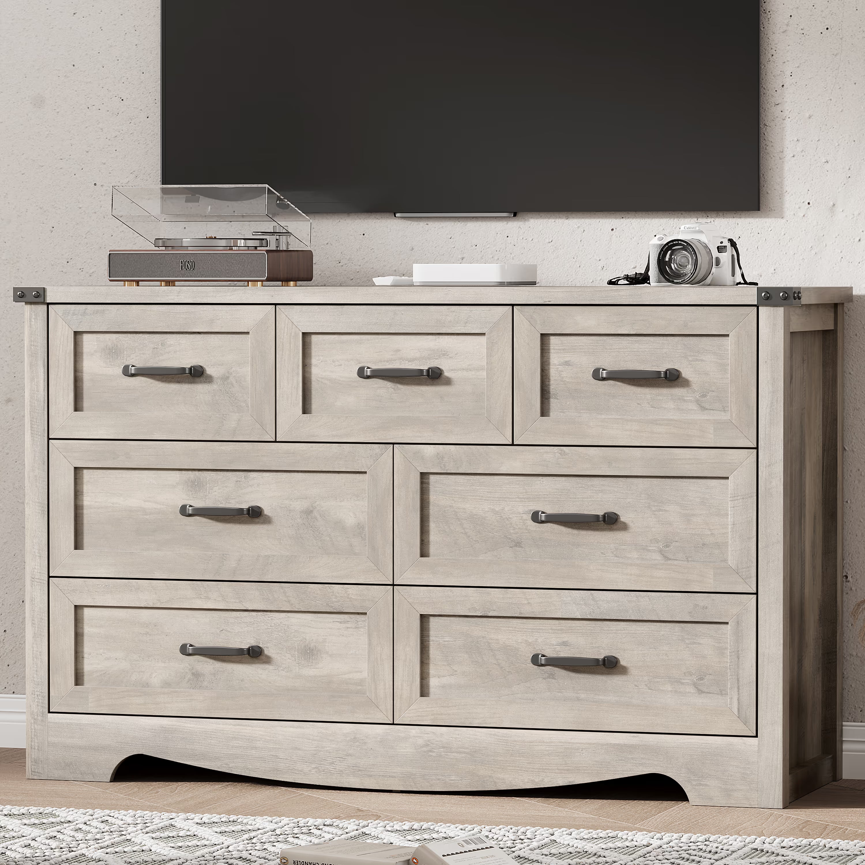 Anymaple Marlow Collection Gray Oak 7-drawer wide dresser with deep storage drawers and black metal handles, TV stand room view