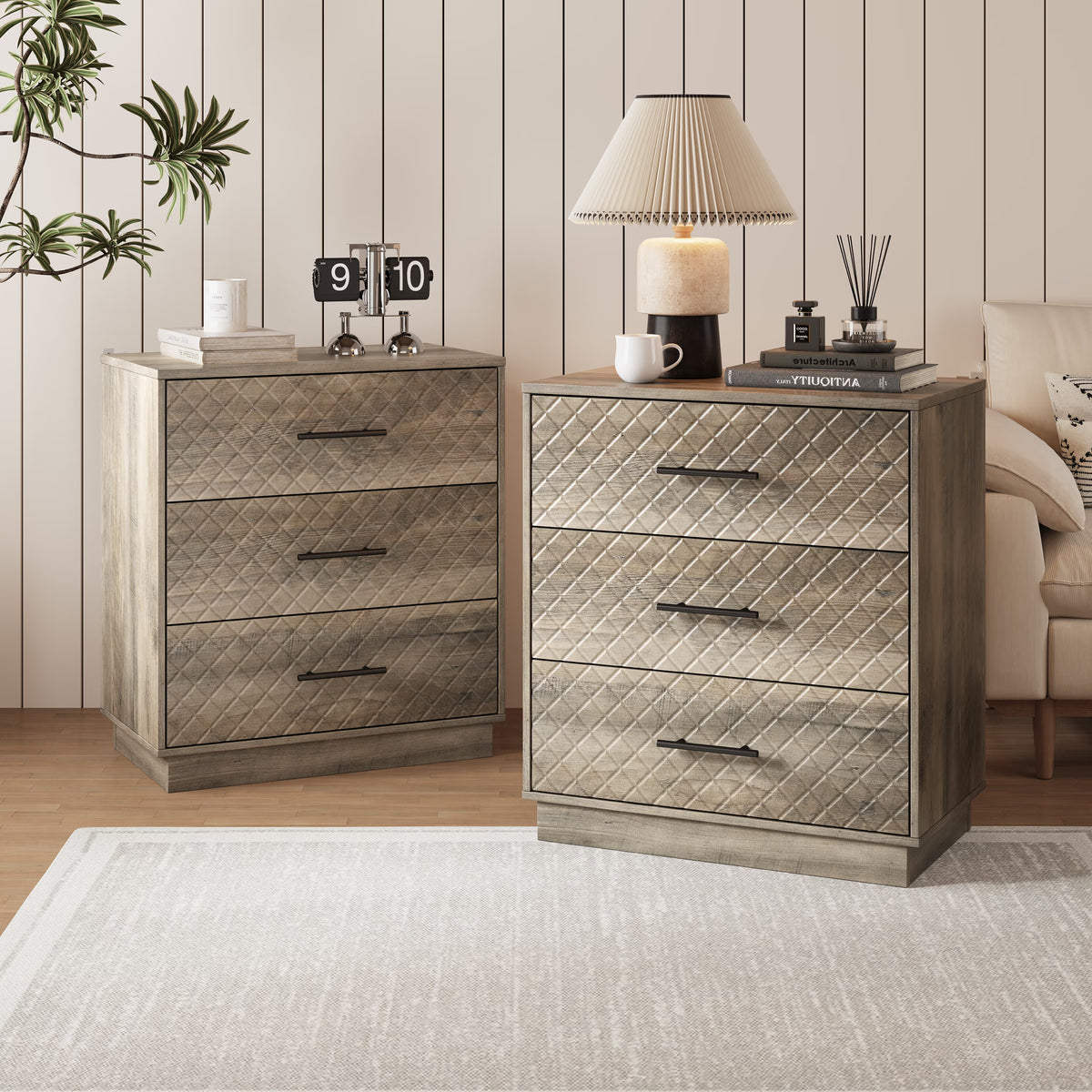 Set of two wood gray 3-drawer dressers styled together in a living room