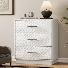 White Prisma 3-drawer dresser with diamond line fronts and gold handles in a modern bedroom