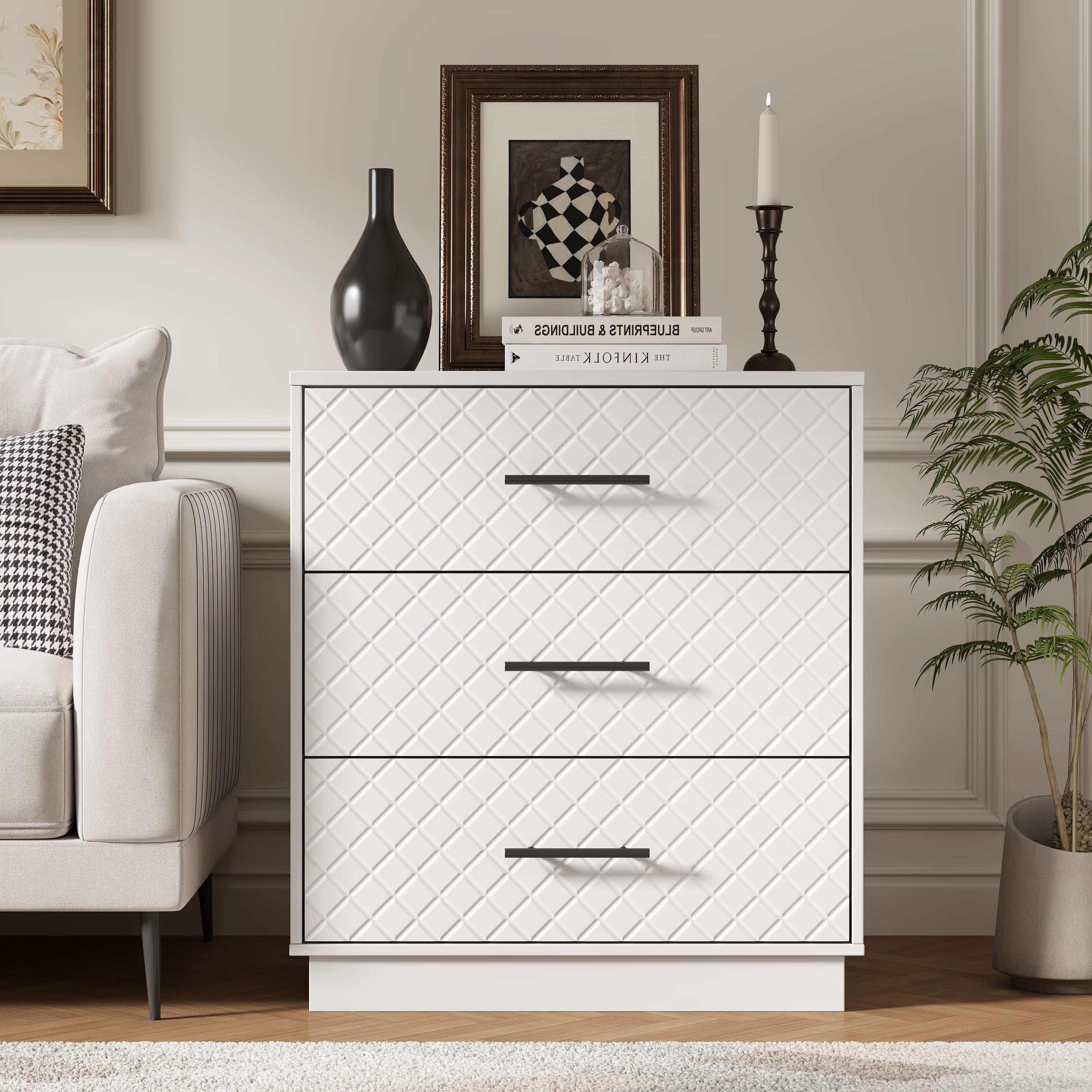 White 3-drawer dresser with diamond line fronts beside a sofa in the living room