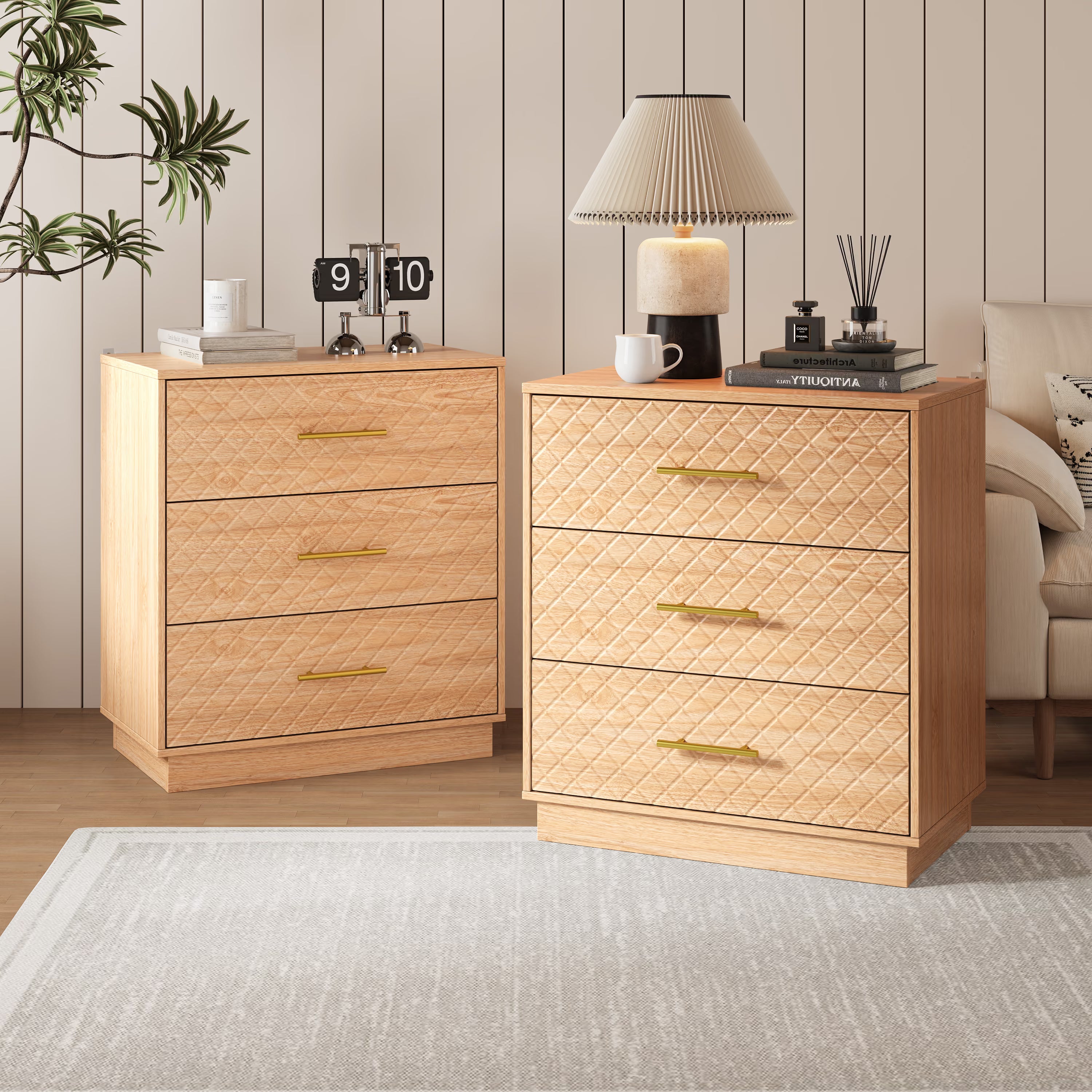 Set of two oak wood 3-drawer dressers styled together in a living room