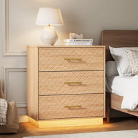 Oak wood 3-drawer dresser with warm LED base light styled as a bedside nightstand