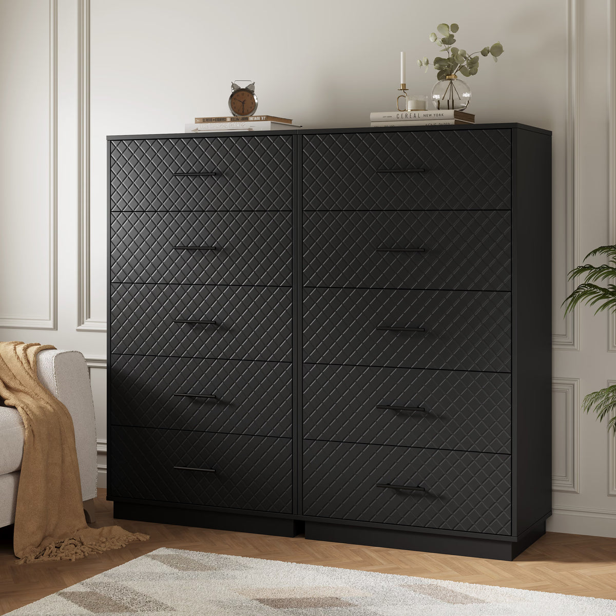 Set of two black tall 5-drawer dressers side by side in a living room