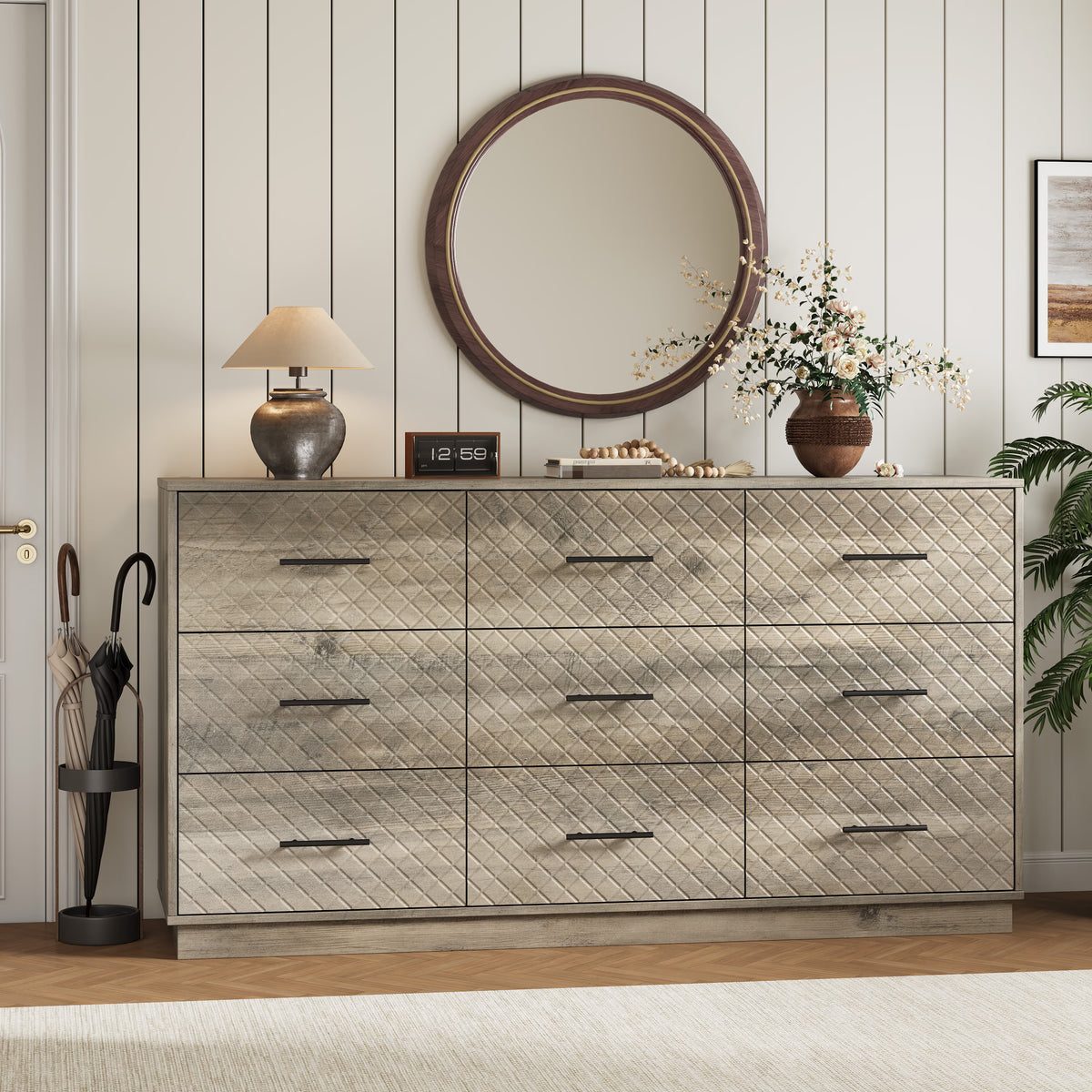 Wood gray 9-drawer double dresser styled in an entryway with a round mirror