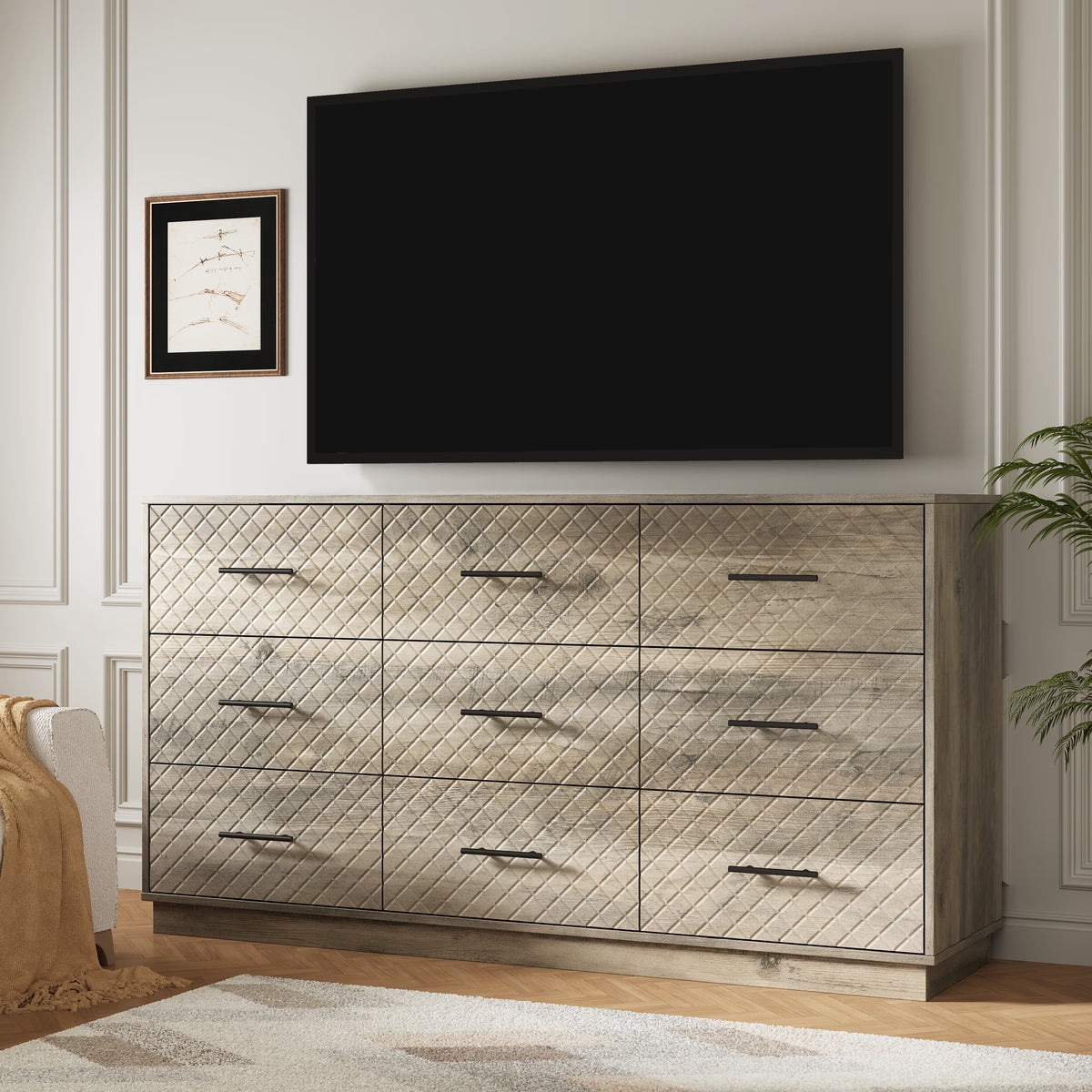 Wood gray 9-drawer double dresser used as a TV stand under a wall-mounted TV