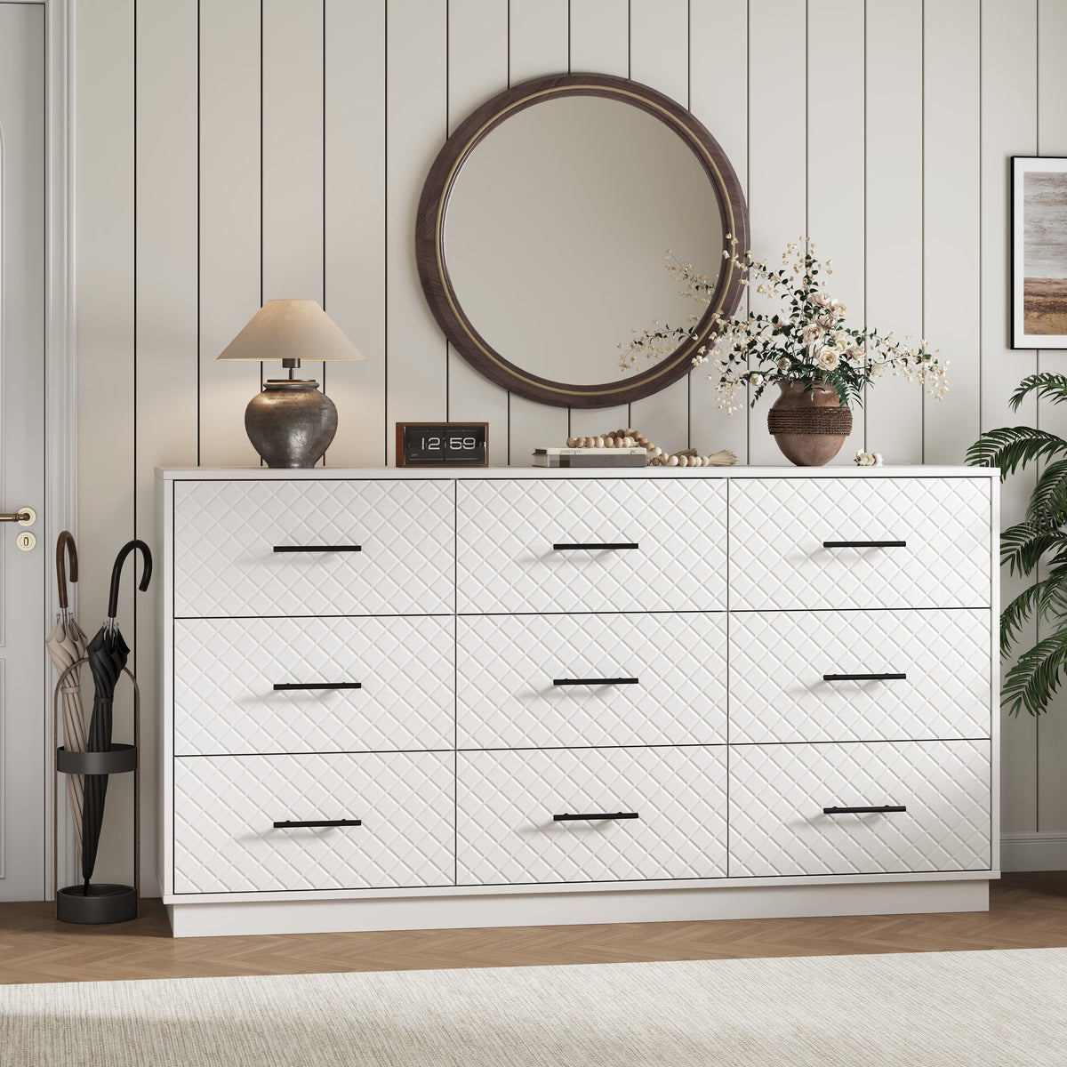 White 9-drawer double dresser styled in an entryway with a round mirror