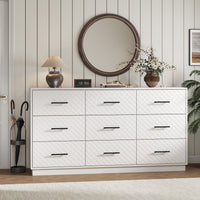 White 9-drawer double dresser styled in an entryway with a round mirror