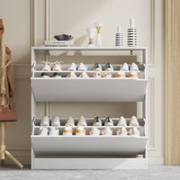 Stylish white entryway shoe cabinet with decorative vases on top, featuring ample shoe cabinet storage for your daily footwear and sneakers.