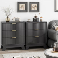 Two Linea black 3-drawer nightstands placed side by side next to a sofa, creating a wide fluted dresser for extended living room storage.