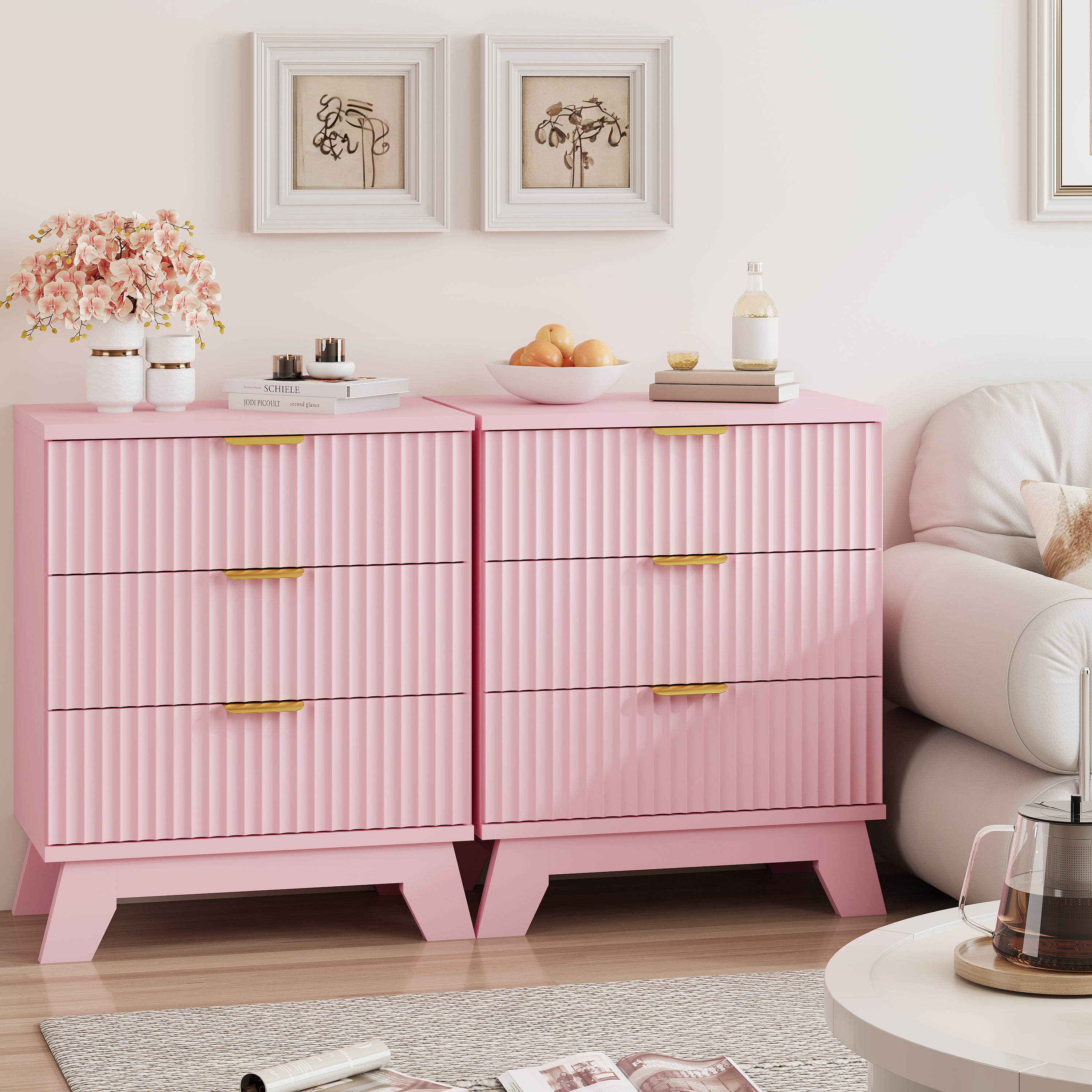 Two Linea pink 3-drawer nightstands placed side by side next to a sofa, creating a wide fluted dresser for extended living room storage.