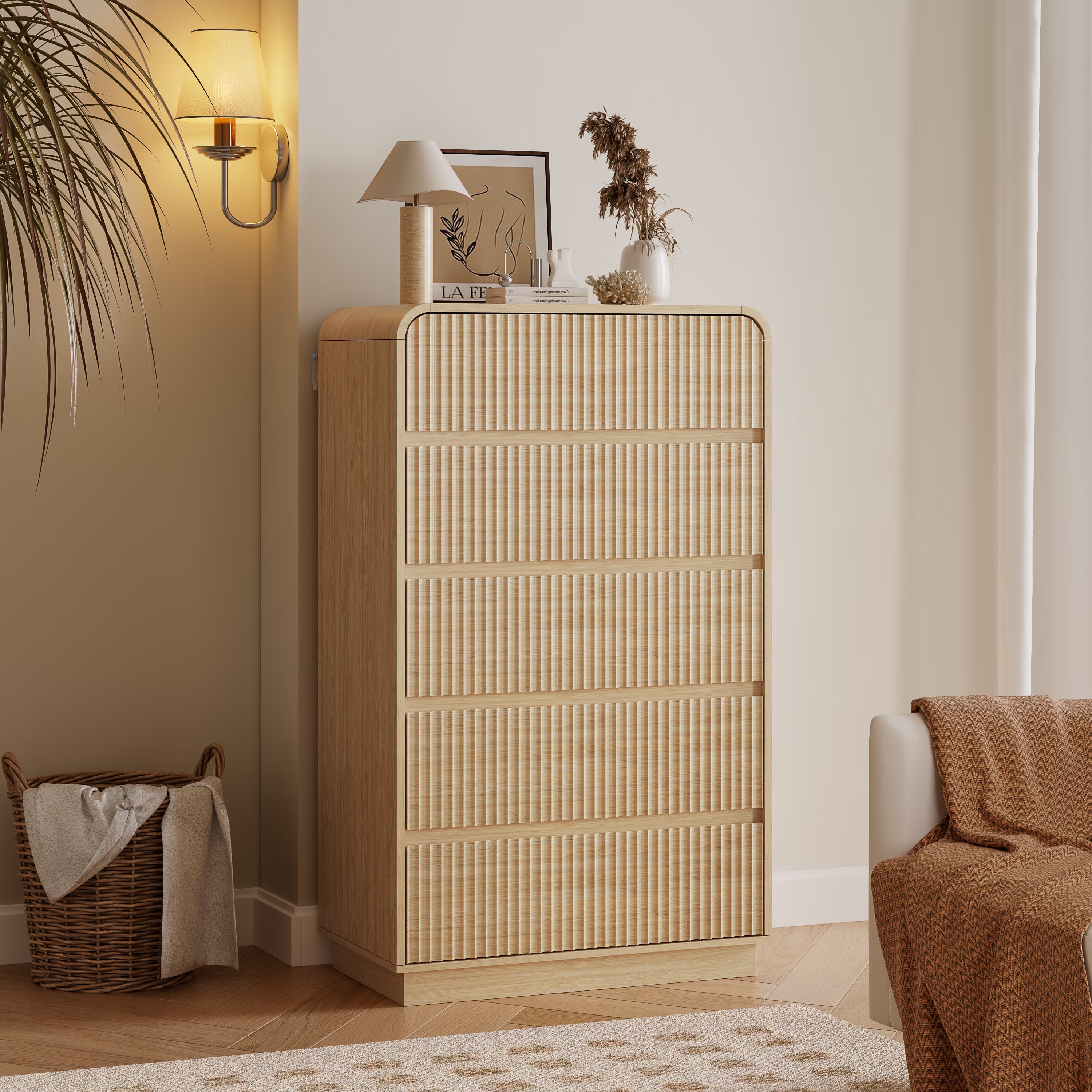 Linea modern oak tall dresser for bedroom with 5 fluted drawers in a cozy living room setting.